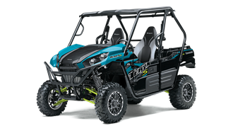 A blue and black atv is parked on a white background.