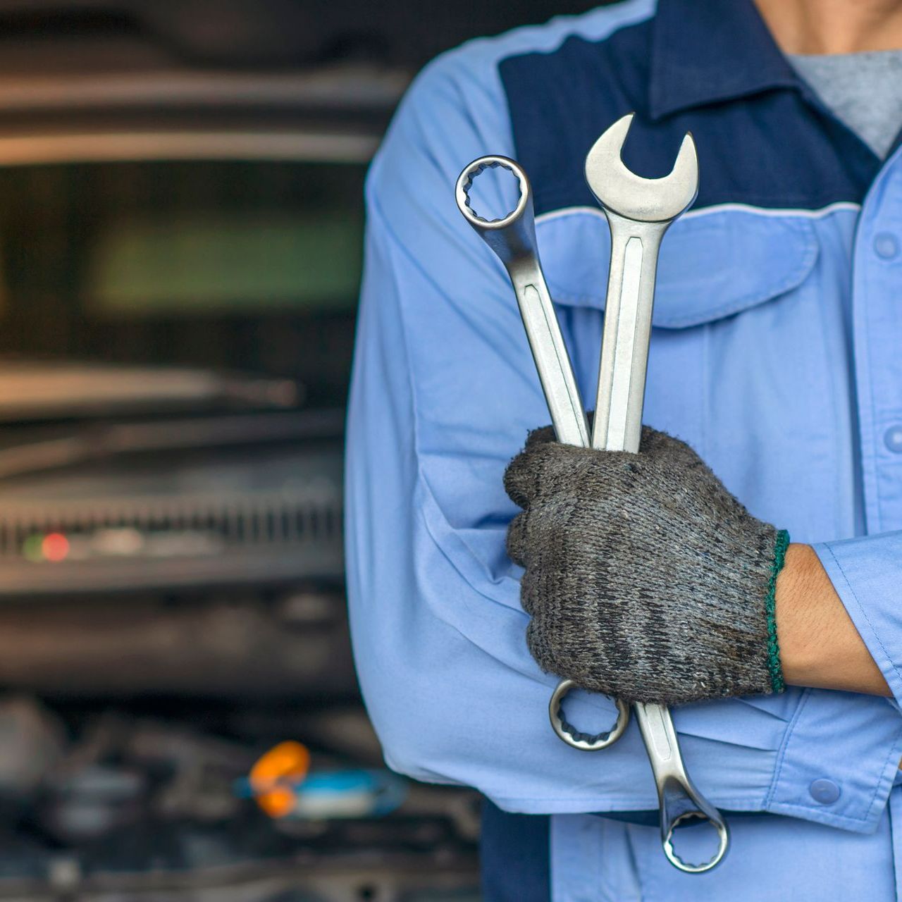 Holding Two Wrenches - Des Moines, IA - Town & Country Service Center Holding Two Wrenches - Des Moines, IA - Town & Country Service Center