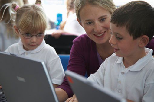 Education — Children studying on computer — Montessori School in La Puente, CA