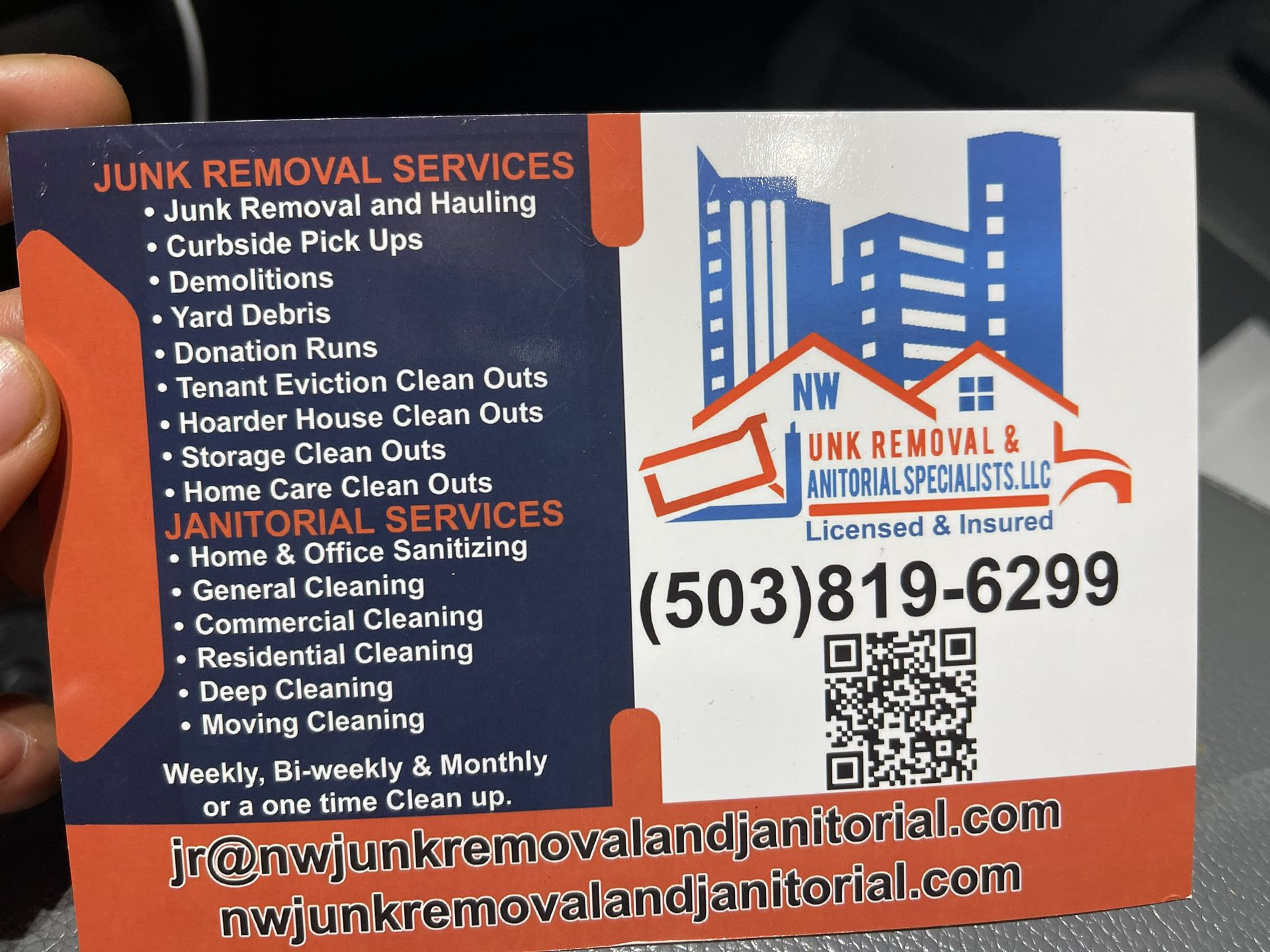 Business card for junk removal and janitorial services with contact info.