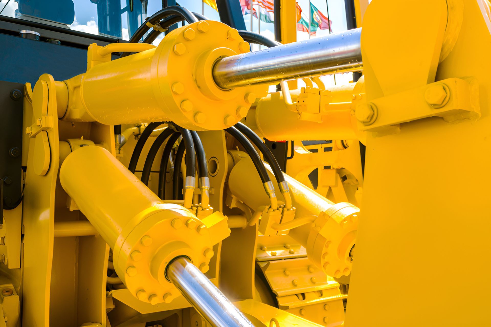 A Close Up Of A Yellow Hydraulic System On A Bulldozer — Gillies Enterprises Pty Ltd In Narrabri, NSW