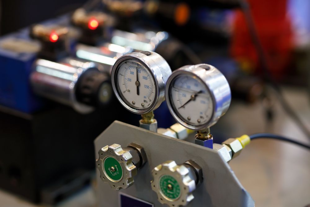 A Close Up Of Two Pressure Gauges On A Machine — Gillies Enterprises Pty Ltd In Narrabri, NSW
