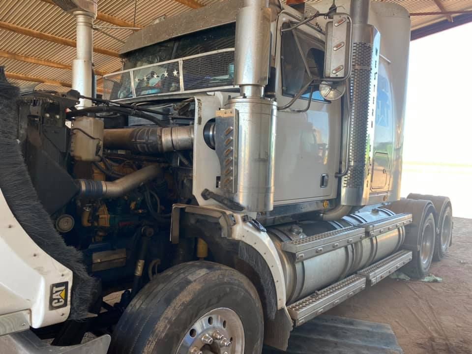 A large semi truck is parked in a garage. — Gillies Enterprises Pty Ltd In Narrabri, NSW