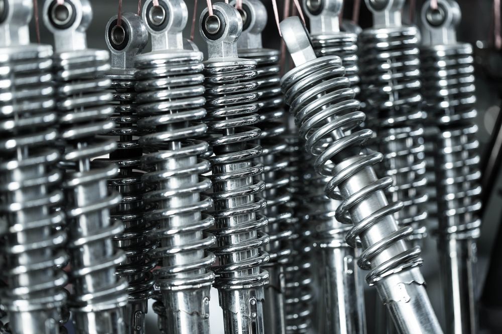 A Bunch Of Shock Absorbers Are Lined Up In A Row — Gillies Enterprises Pty Ltd In Narrabri, NSW