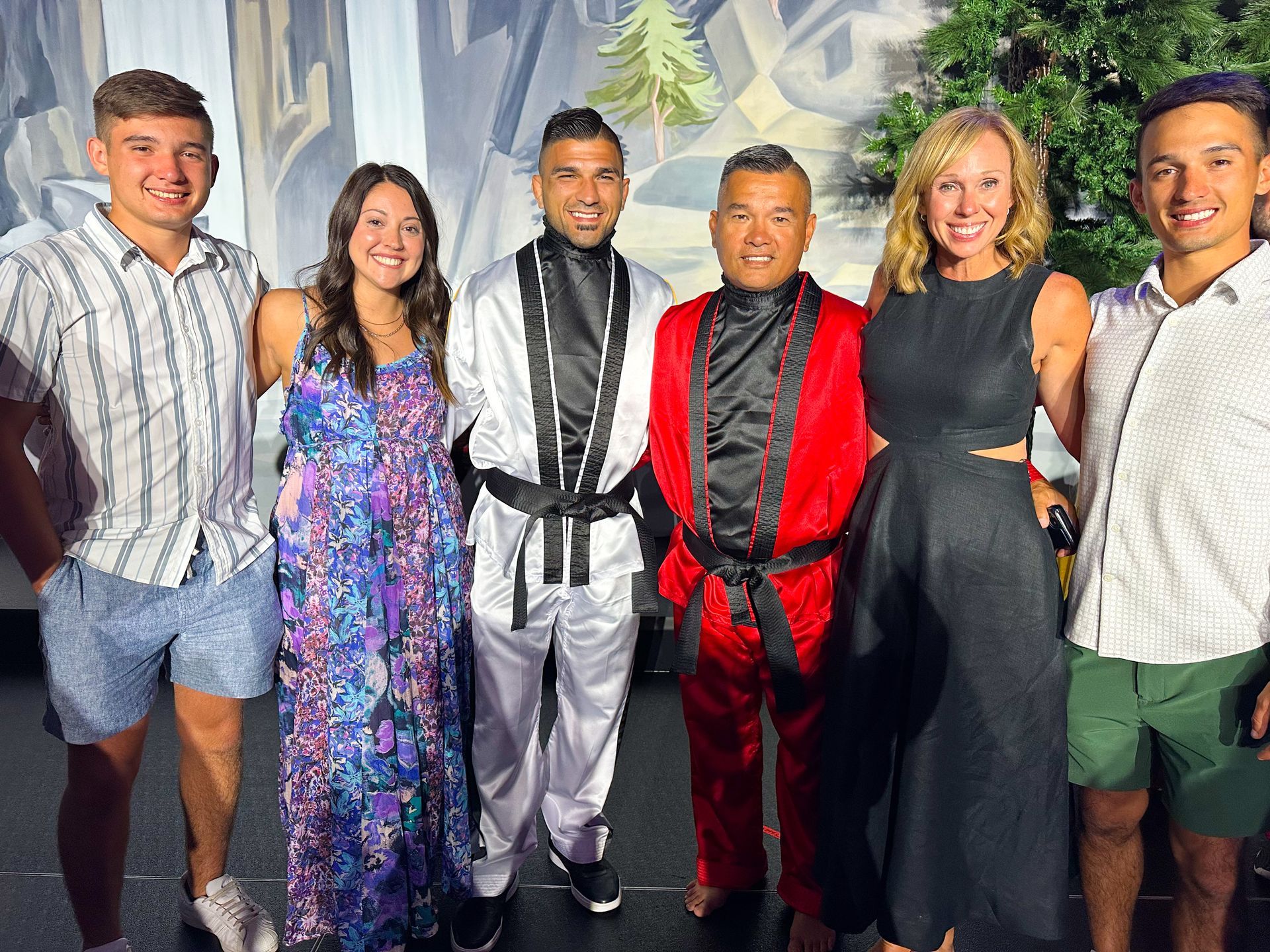 A group of people are posing for a picture together.