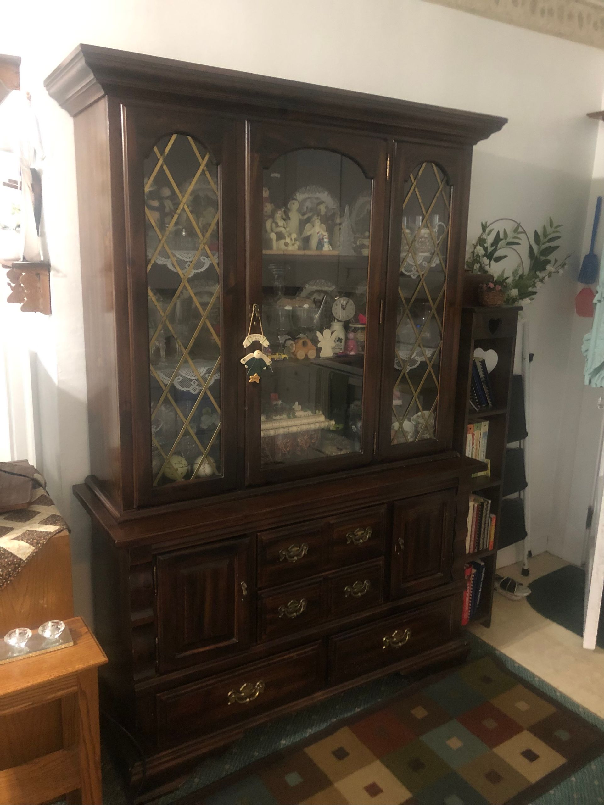Glass display cabinet with collectibles — Sheffield, IL — Johnson Agency