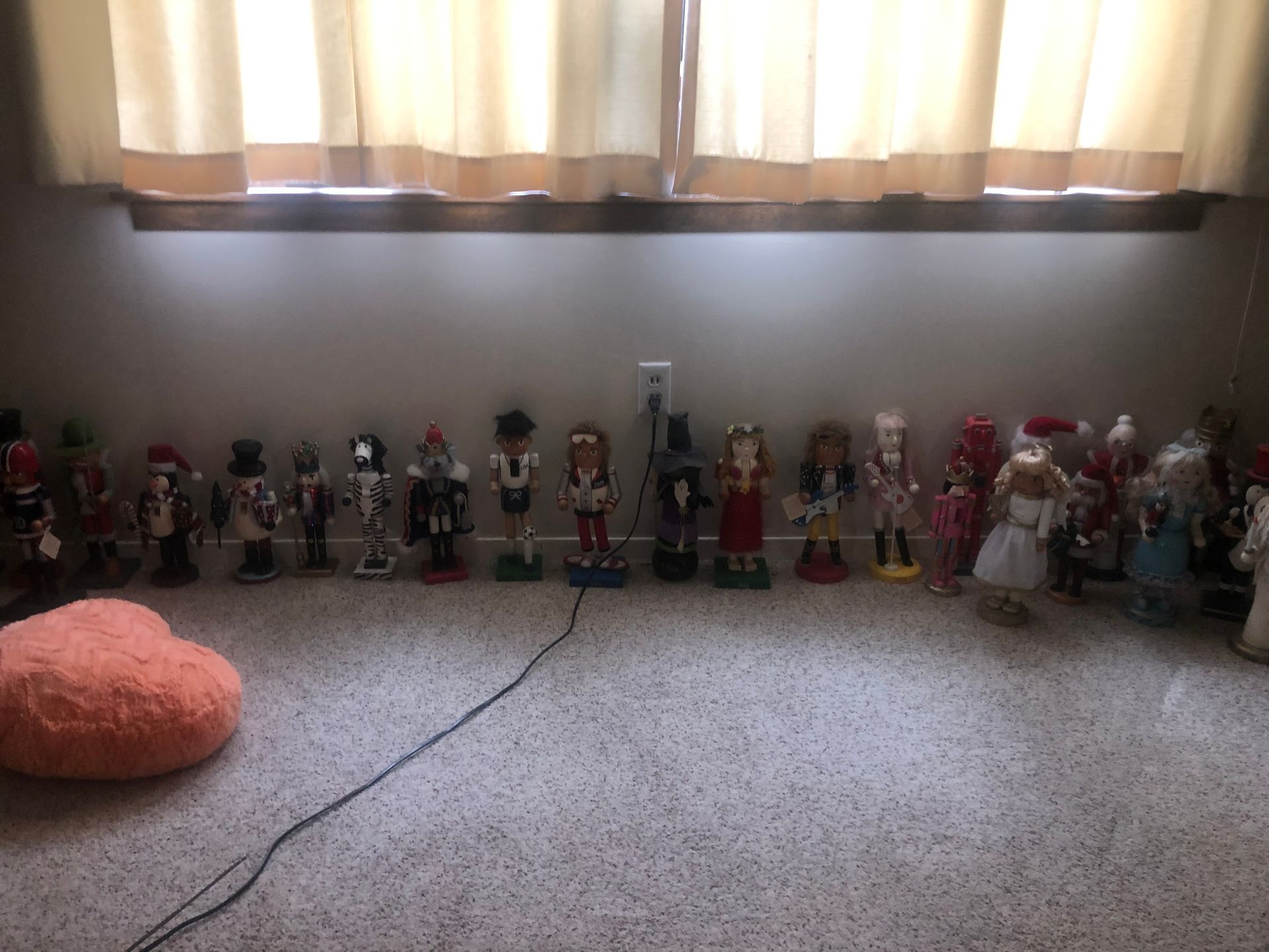 Collection of figurines displayed near window — Sheffield, IL — Johnson Agency