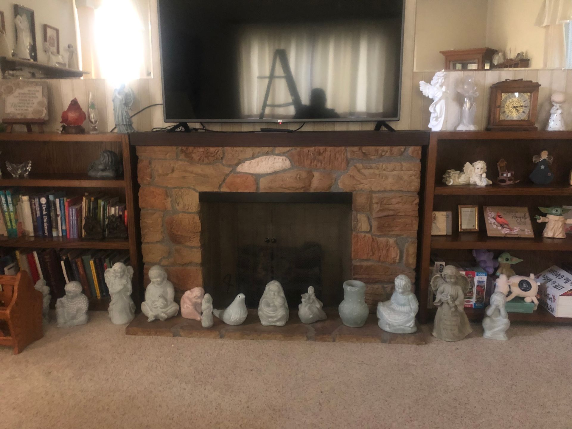 Fireplace mantel with decorative items — Sheffield, IL — Johnson Agency