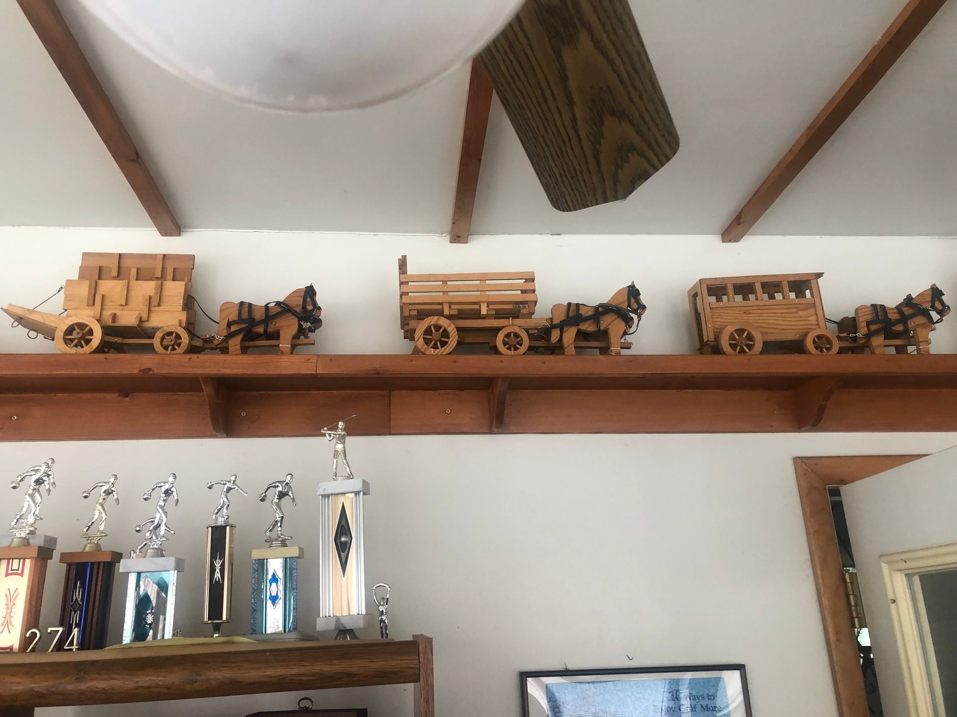 Wooden shelf with miniature decor — Sheffield, IL — Johnson Agency