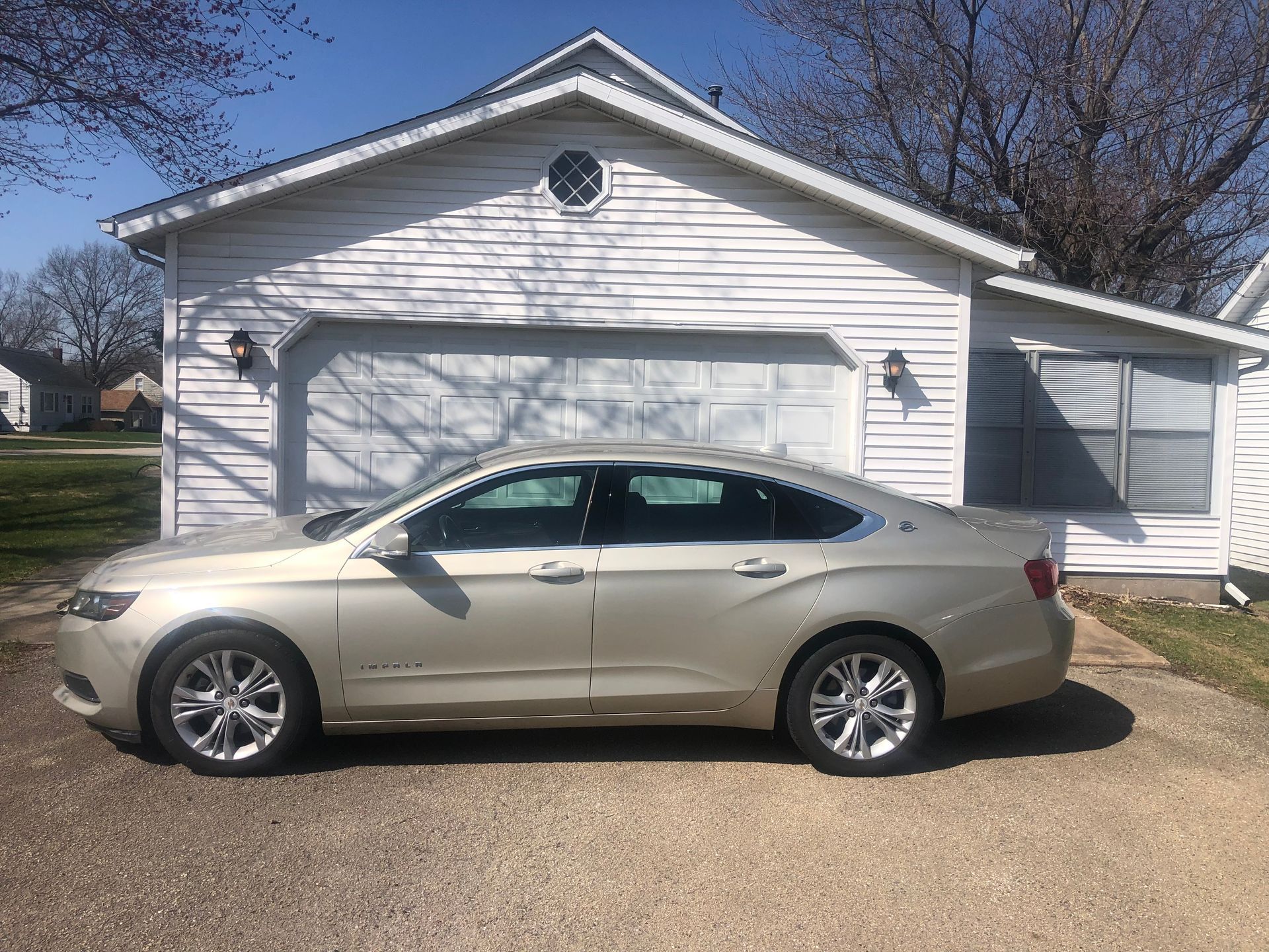 Garage exterior with parked car — Sheffield, IL — Johnson Agency