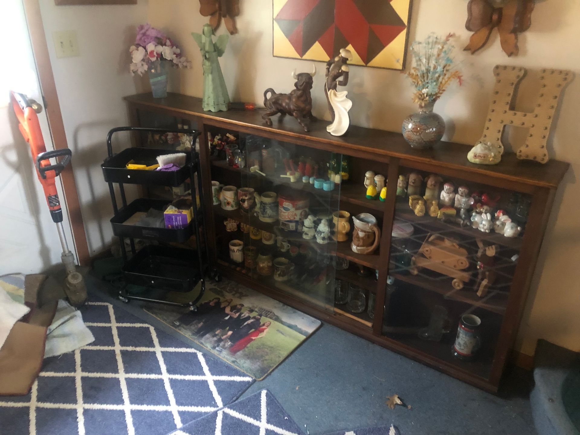 Display cabinet with figurines and decor — Sheffield, IL — Johnson Agency