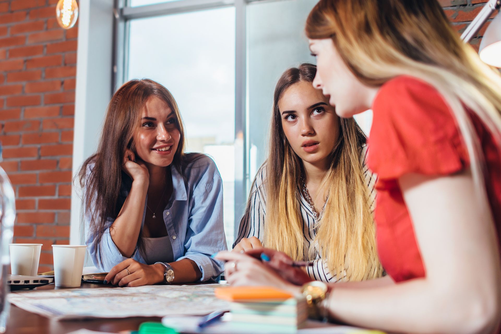 the young woman and her classmates are studying levels of emotional intelligence