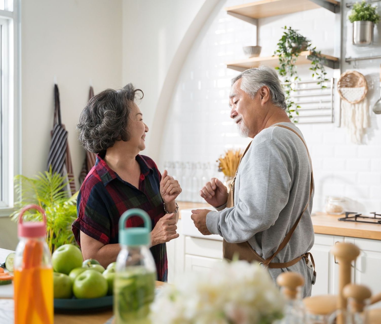 the couple continues to dance while cooking together, they have transparency in their relationship