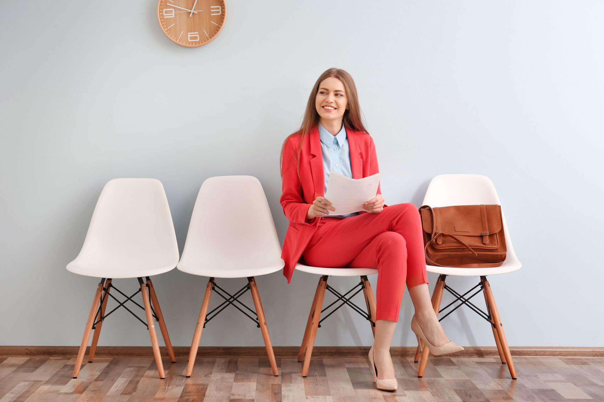 The same woman now sits in a lobby waiting to be called in for an interview, she's changed her mind on what success looks like