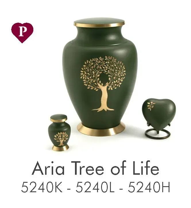 A green vase with a tree on it