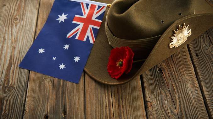 Image of the Australian Military Slouch Hat with an Australian flag next to it
