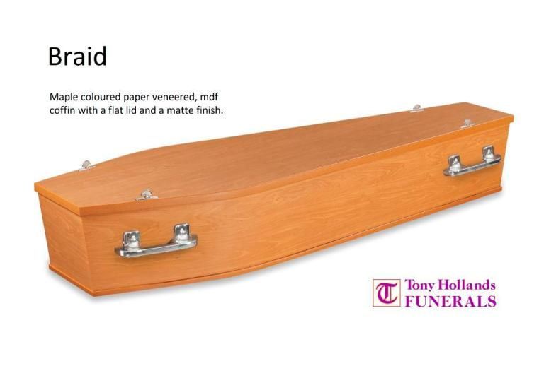 A wooden coffin with the word braid on it