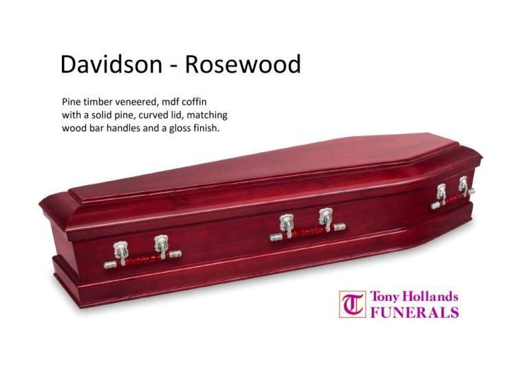 A red coffin with the name davidson on it