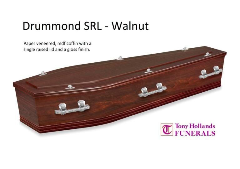 A drummond srl walnut coffin with silver handles