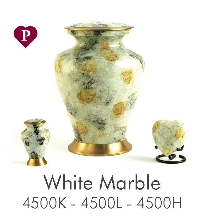 A white marble urn with a heart on it