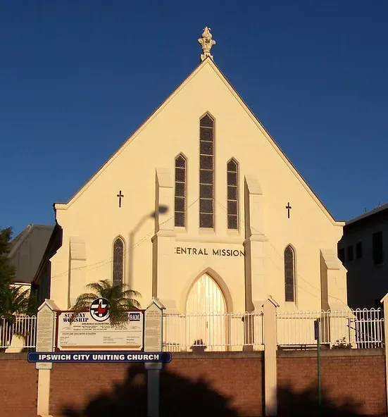 A church with a sign that says central mission