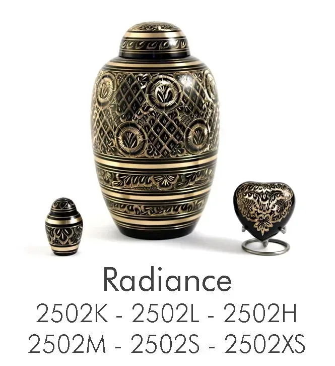 A black and gold urn with a smaller urn and a heart shaped urn.