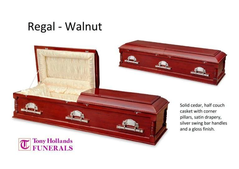 A picture of a regal walnut coffin with the lid open