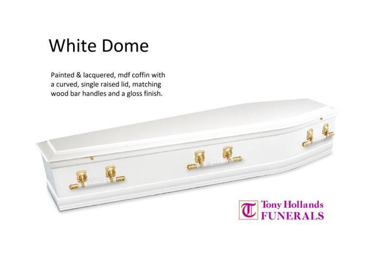 A white dome coffin with gold handles and a glass finish