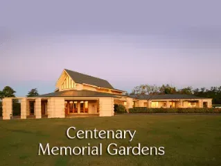 A large building with the words centenary memorial gardens on it