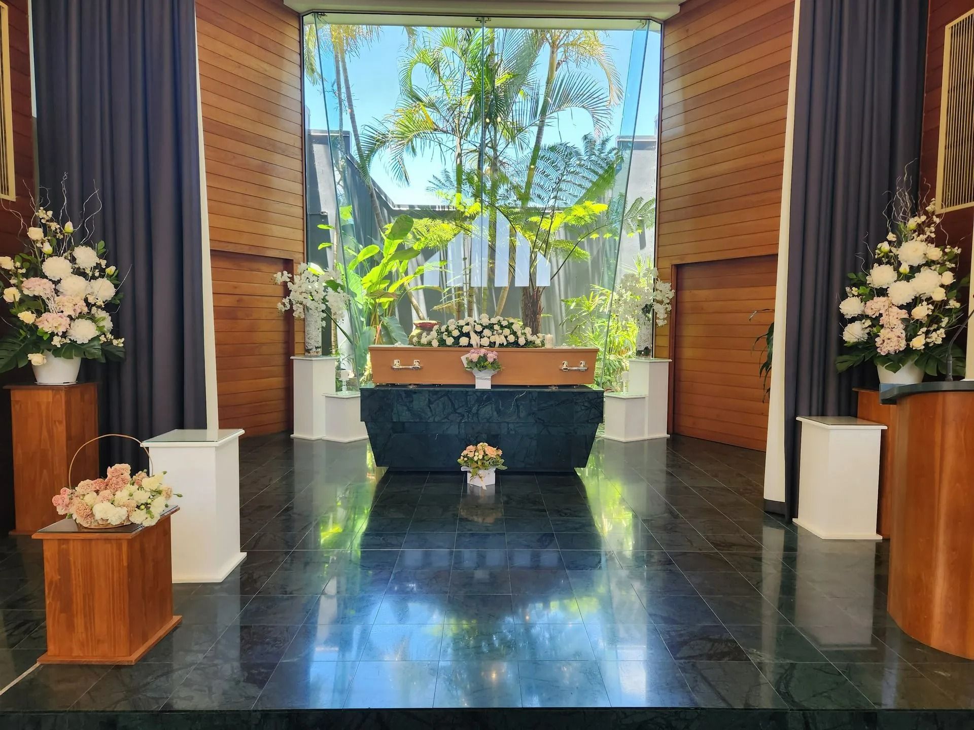 There is a coffin in the middle of the room.