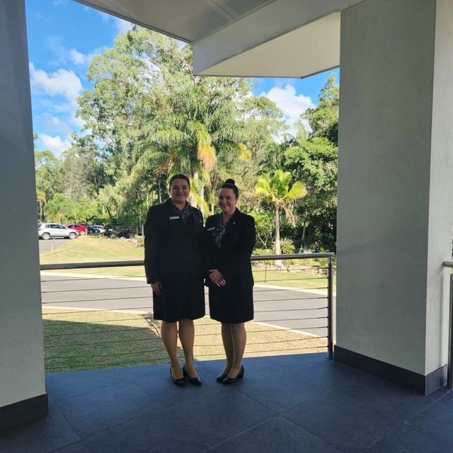 Image of two Lady Funeral Directors standing outside a chapel
