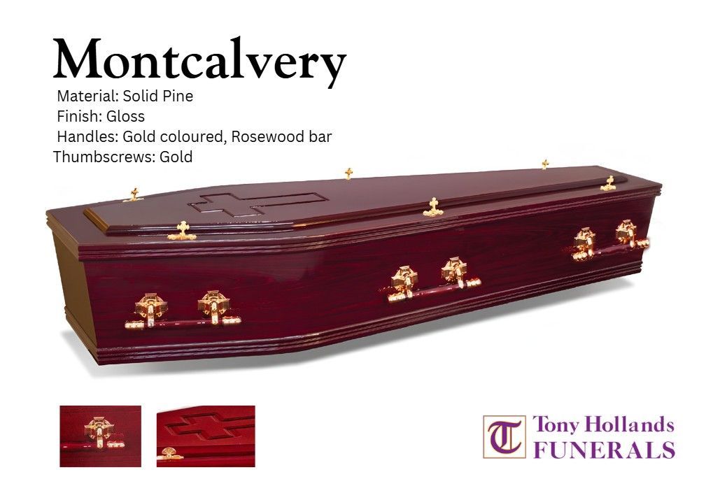 A wooden coffin with a cross engraved on it