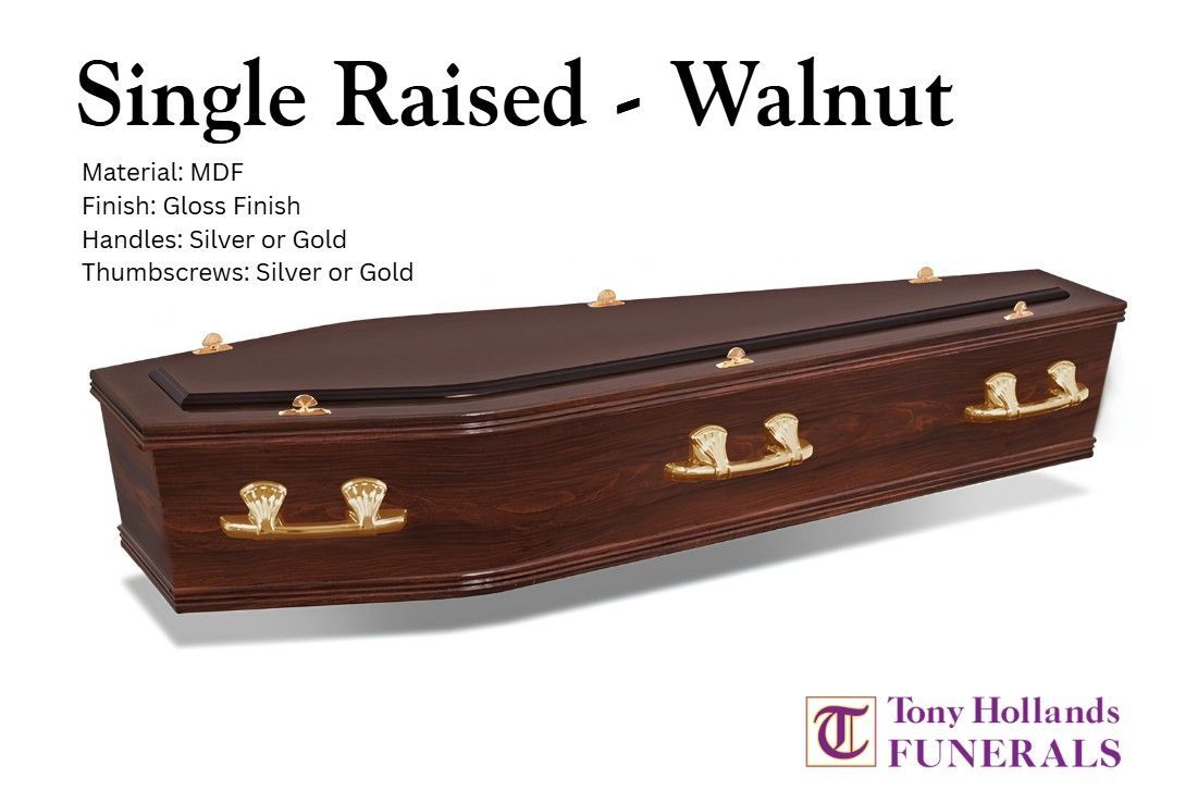 A drummond srl walnut coffin with silver handles