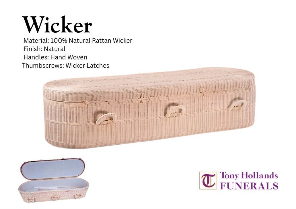 A wicker coffin with curved ends and rope handles.