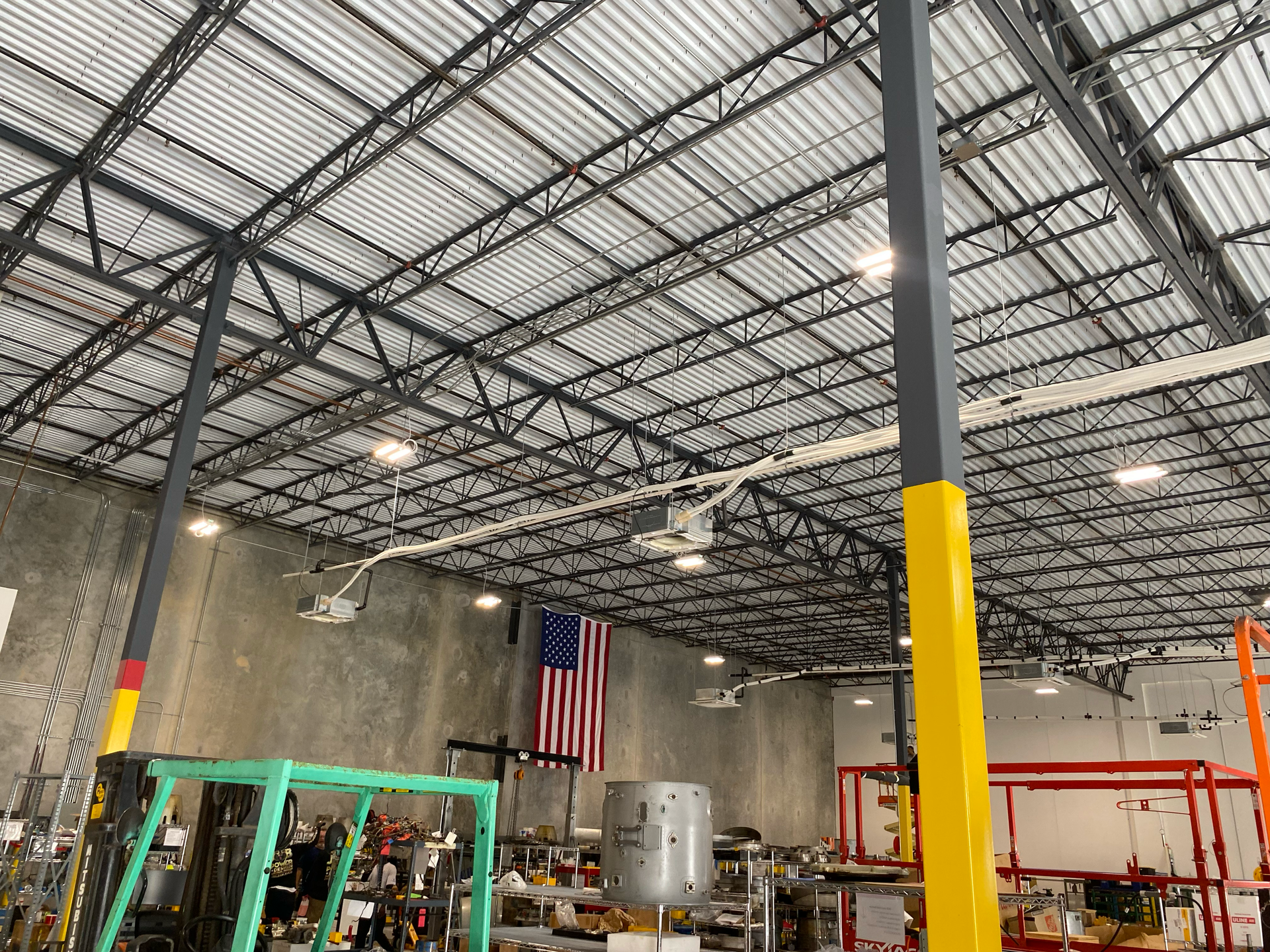 Warehouse interior with commercial mini split HVAC installed by Mintz Heating & Cooling