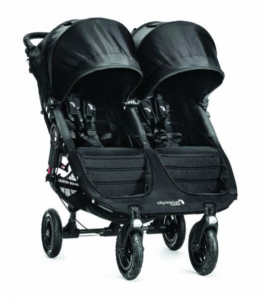 A red and black mobility scooter with a basket on the front.