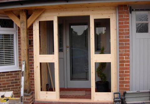 a handcrafted wooden front door