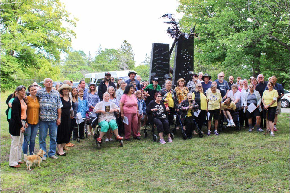 Those who attended the unveiling of the HRC survivors' monument in 2019 pose for a photo. Nathan Taylor/OrilliaMatters file photo