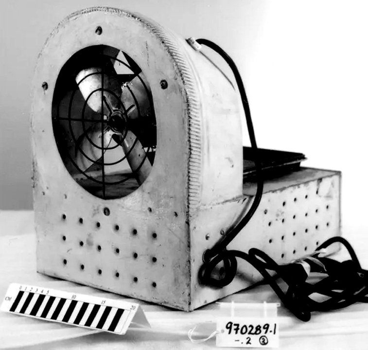 A Resperin vaporizer. It is a clunky looking machine with a fan at one end. Behind this is a tray, where Resperin would presumably be placed. Vaporizors like this one were used to release Resperin into the air during the experiments. Image from the Ontario Museum of Science and Technology.