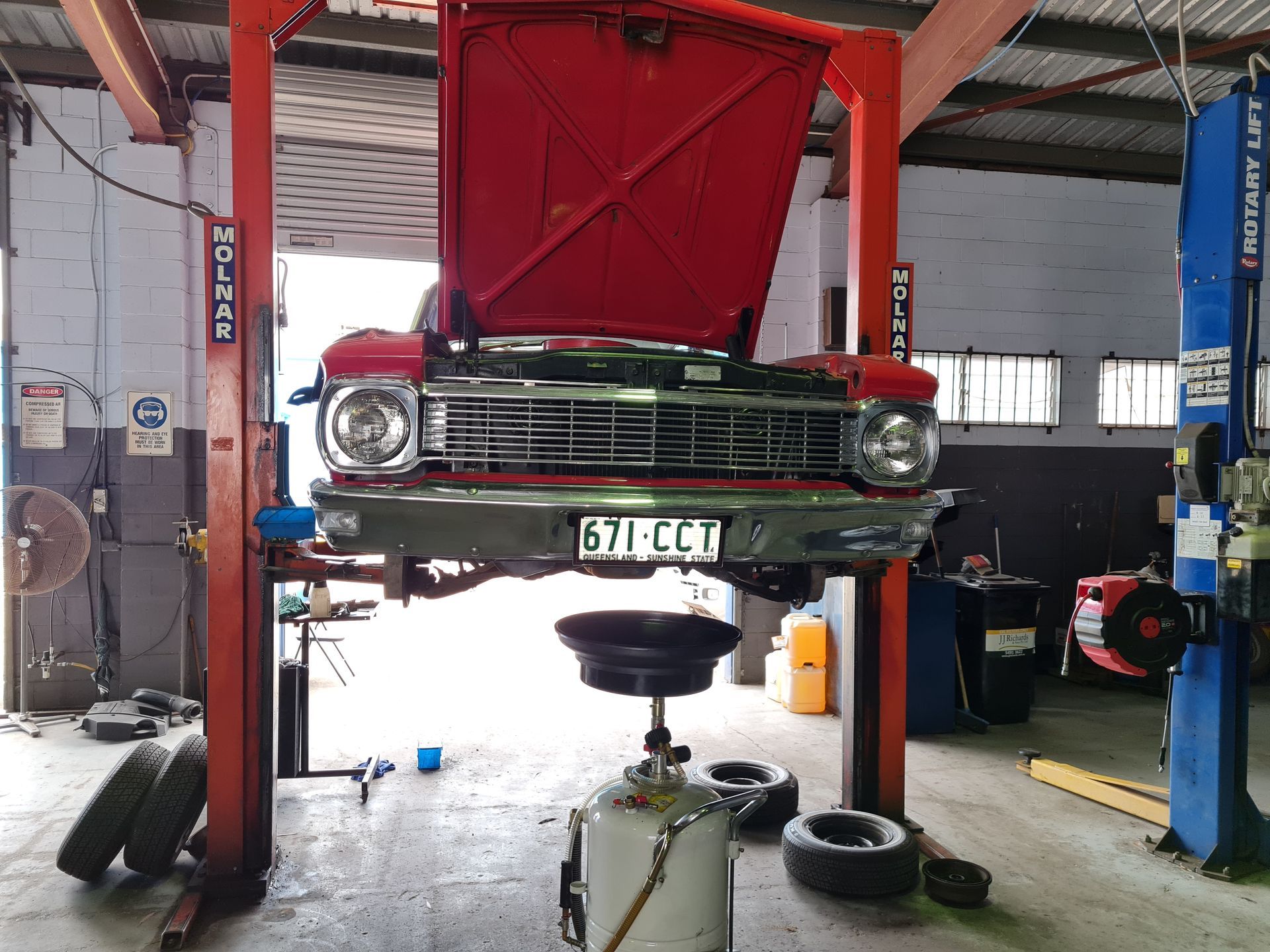 Male Mechanics Works with Car Engine — Total Auto Service In Caloundra West, QLD