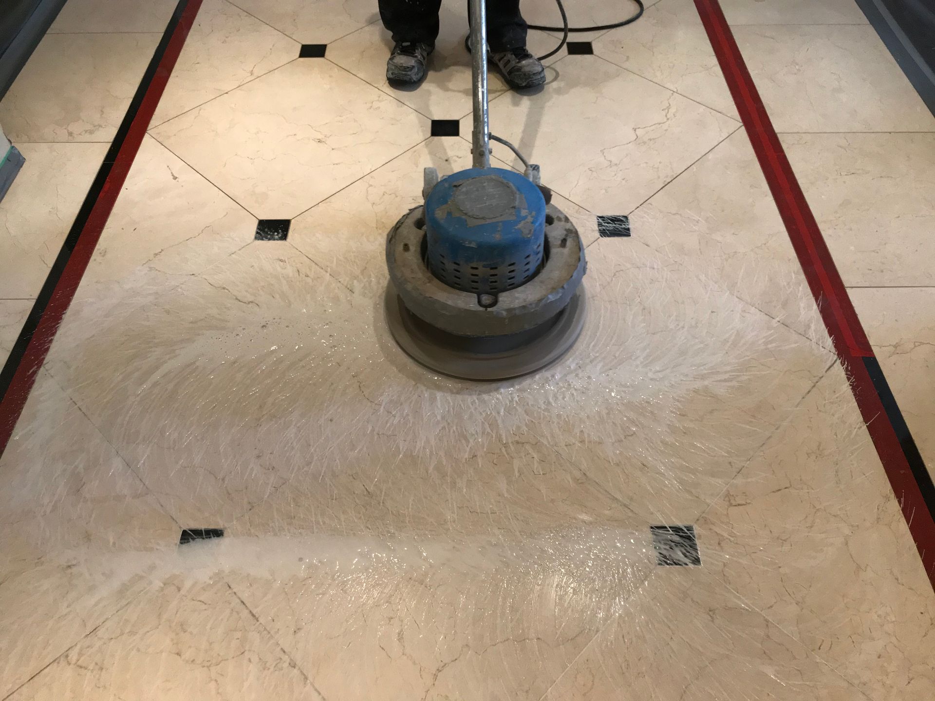 man polishing floor