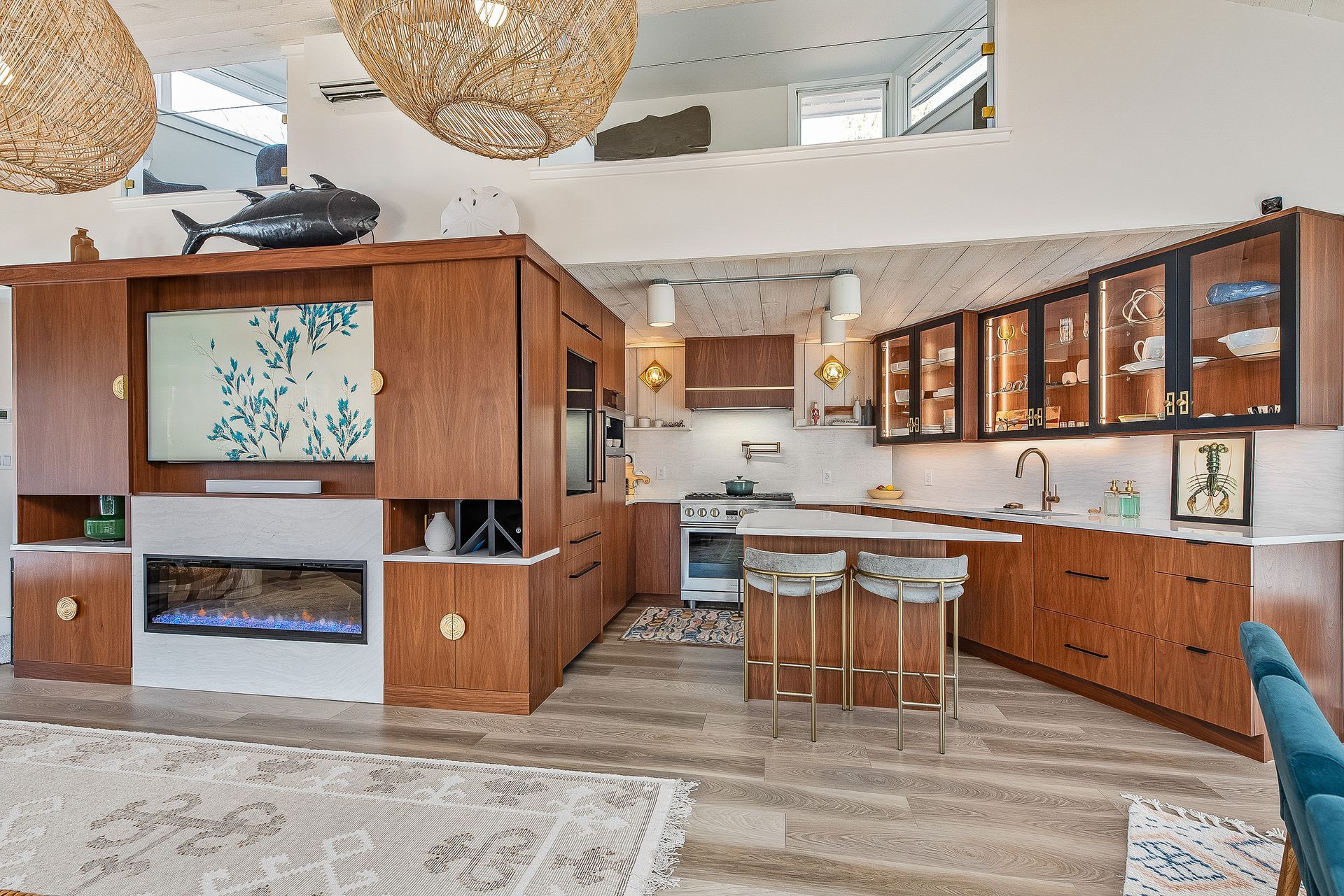 A kitchen with wooden cabinets and a fireplace