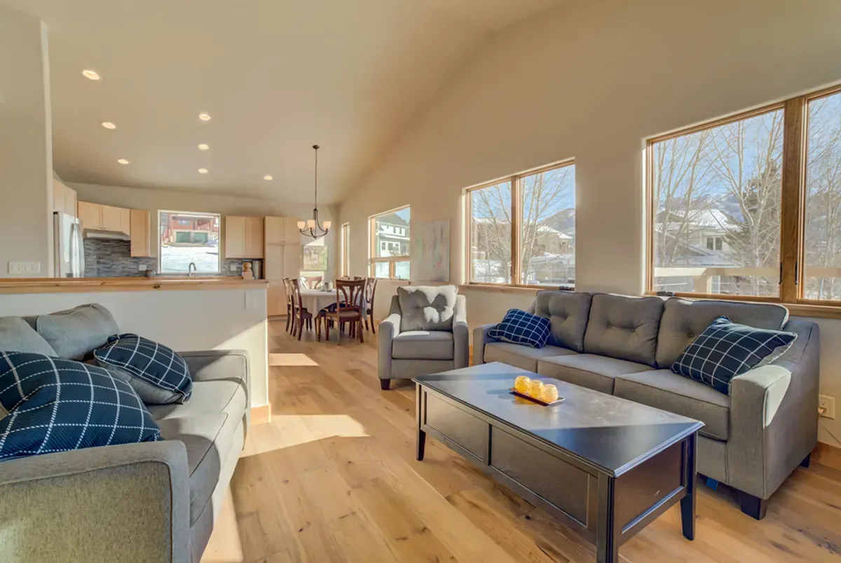 A living room filled with furniture and a coffee table.