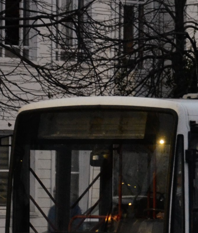 A bus with the number 23 on the front of it