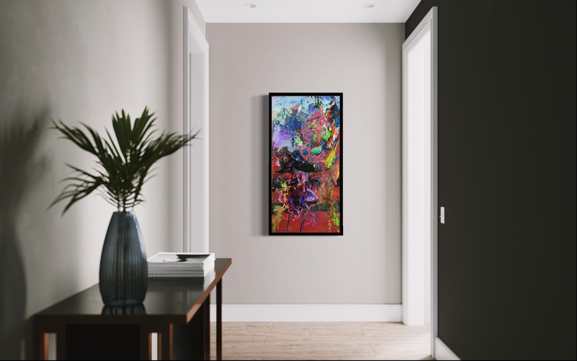 There is a painting on the wall in the hallway.