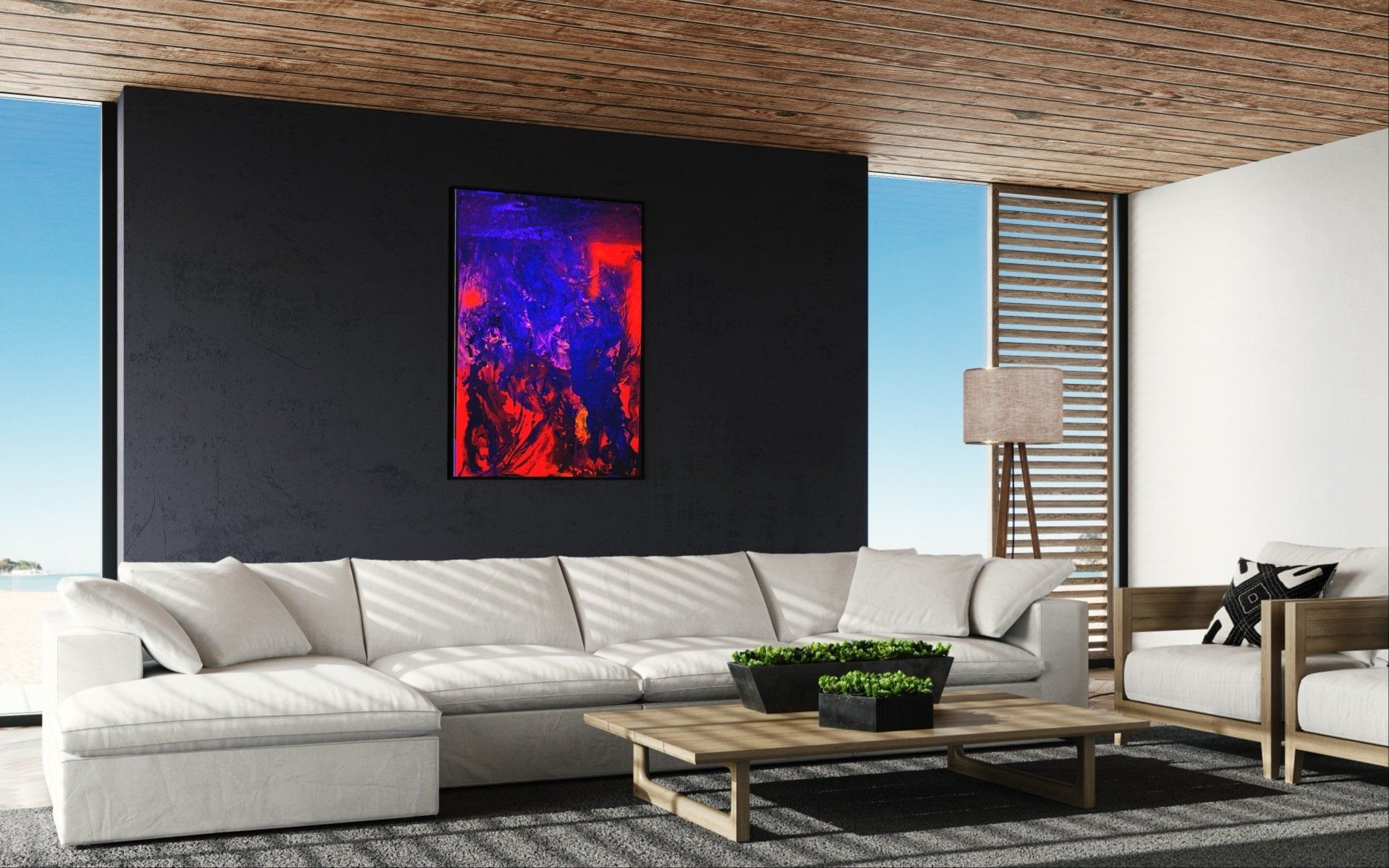 A living room with a couch , coffee table , chairs and a painting on the wall.