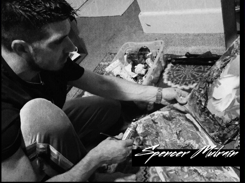 A black and white photo of a man with the name spencer on the bottom