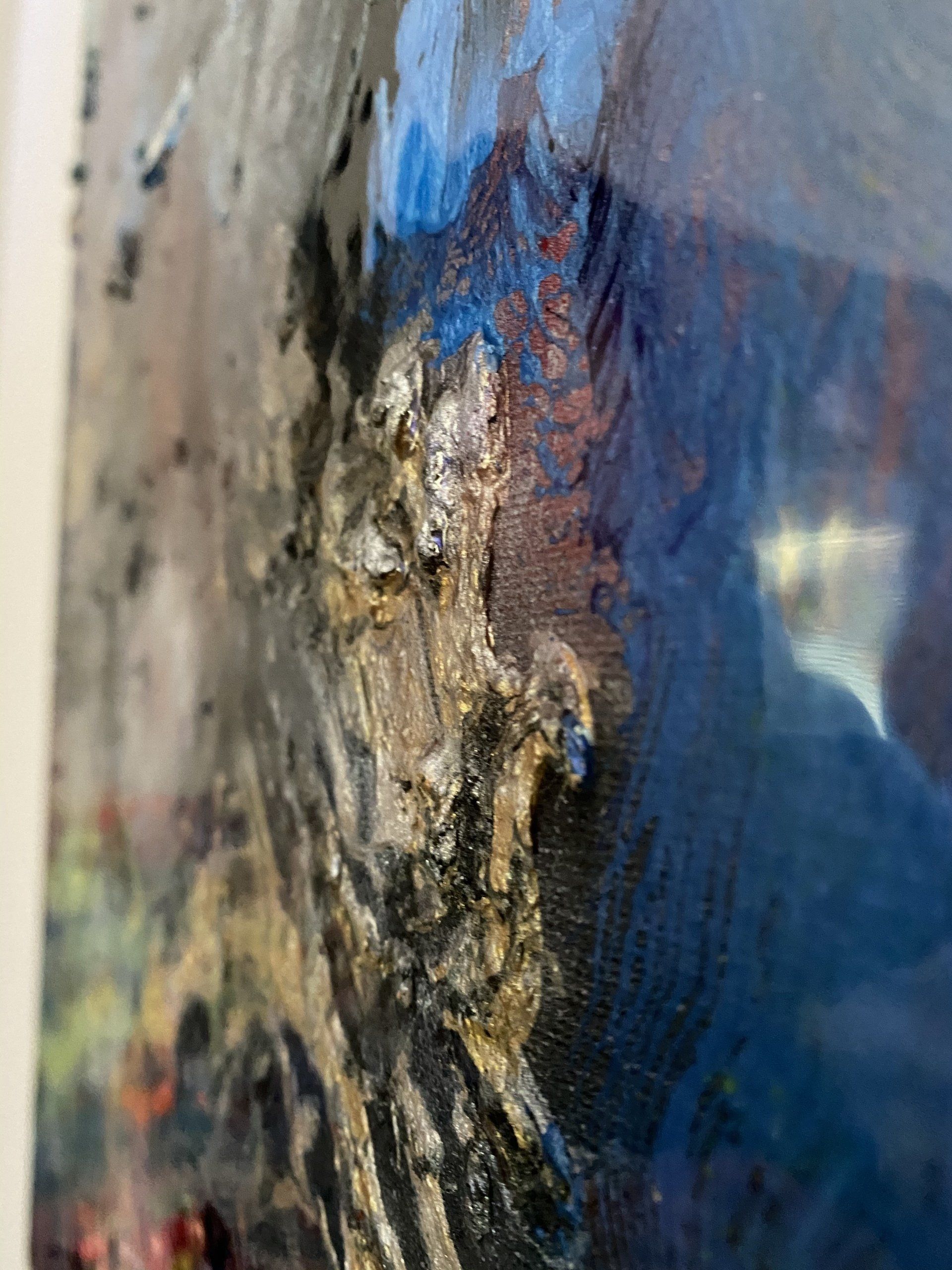 A close up of a painting on a wall.