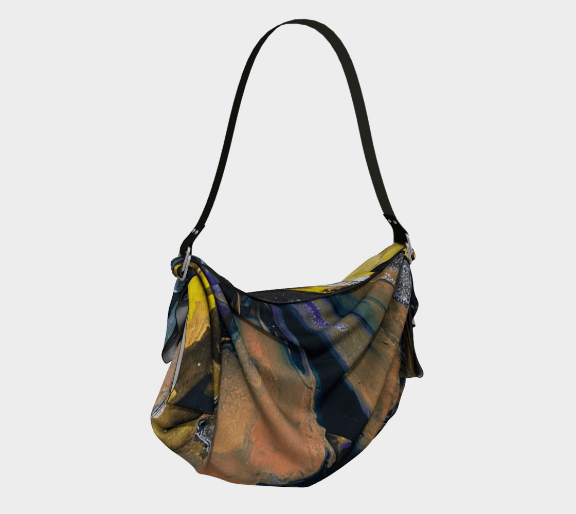 A colorful purse with a black strap on a white background