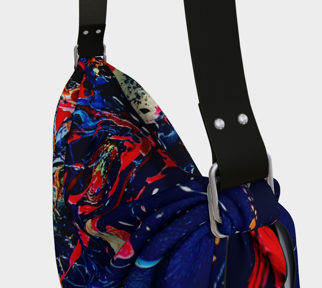 A blue and red purse with a black strap